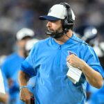Aug 22, 2025; Nashville, Tennessee, USA; Tennessee Titans head coach Brian Callahan walks the sideline against the Minnesota Vikings during the first half at Nissan Stadium.
