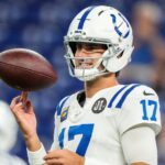 Indianapolis Colts quarterback Daniel Jones (17) spins the ball on his fingers Sunday, Sept. 14, 2025, ahead of the game against the Denver Broncos at Lucas Oil Stadium in Indianapolis.