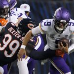 Sep 8, 2025; Chicago, Illinois, USA; Chicago Bears defensive tackle Gervon Dexter Sr. (99) tackles Minnesota Vikings quarterback J.J. McCarthy (9) during the first half at Soldier Field.