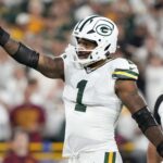 Sep 11, 2025; Green Bay, Wisconsin, USA; Green Bay Packers defensive end Micah Parsons (1) reacts in the first quarter against the Washington Commanders at Lambeau Field.