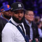 Apr 6, 2025; New York, New York, USA; NFL wide receiver Odell Beckham Jr. sits courtside during the second half of the NBA game between the New York Knicks and the Phoenix Suns at Madison Square Garden.