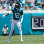 Sep 7, 2025; Jacksonville, Florida, USA; Jacksonville Jaguars wide receiver Travis Hunter (12) lines on the line of scrimmage prior to a play against the Carolina Panthers during the first half at EverBank Stadium.