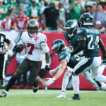 Sep 28, 2025; Tampa, Florida, USA; Tampa Bay Buccaneers running back Bucky Irving (7) runs the ball during the second half against the Philadelphia Eagles at Raymond James Stadium. Mandatory Credit: Kim Klement Neitzel-Imagn Images
