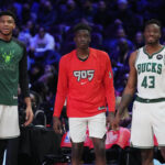 Feb 19, 2022; Cleveland, OH, USA; Team Antetokounmpo player Giannis Antetokounmpo (34), Team Antetokounmpo player Alex Antetokounmpo (29) and Team Antetokounmpo player Thanasis Antetokounmpo (43) look on during the Skills Challenge during the 2022 NBA All-Star Saturday Night at Rocket Mortgage Field House. Mandatory Credit: Kyle Terada-USA TODAY Sports