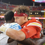 Sep 7, 2023; Kansas City, Missouri, USA; Kansas City Chiefs quarterback Patrick Mahomes (15) embraces Detroit Lions safety C.J. Gardner-Johnson (2) after the game at GEHA Field at Arrowhead Stadium.