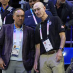 Aug 3, 2024; Villeneuve-d'Ascq, France; NBA commissioner Adam Silver talks to International Basketball Federation board member Mark Tatum in the fourth quarter between the United States and Puerto Rico during the Paris 2024 Olympic Summer Games at Stade Pierre-Mauroy. Mandatory Credit: John David Mercer-USA TODAY Sports