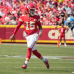 NFL MVP Race 2025 Aug 17, 2024; Kansas City, Missouri, USA; Kansas City Chiefs quarterback Patrick Mahomes (15) throws a behind-the-back underhand pass to tight end Travis Kelce (87) (not pictured) against the Detroit Lions during the first half at GEHA Field at Arrowhead Stadium.