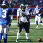 Oct 20, 2024; East Rutherford, New Jersey, USA; NFL; Philadelphia Eagles running back Saquon Barkley (26) reacts after a long run during the second half against the New York Giants at MetLife Stadium.
