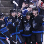 Dec 2, 2024; Toronto, Ontario, CAN; Toronto Maple Leafs forward Matthew Knies (23), defenseman Morgan Rielly (44), forward William Nylander (88), and defenseman Philippe Myers (51) celebrate a goal by forward Auston Matthews (34) against the Chicago Blackhawks during the first period at Scotiabank Arena. Mandatory Credit: John E. Sokolowski-Imagn Images
