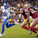 Onde assistir NFL Dec 12, 2024; Santa Clara, California, USA; Los Angeles Rams quarterback Matthew Stafford (9) runs with the ball as San Francisco 49ers linebacker Fred Warner (54) defends in the fourth quarter at Levi's Stadium. Mandatory Credit: Cary Edmondson-Imagn Images