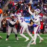 Jan 5, 2025; Foxborough, Massachusetts, USA; Buffalo Bills quarterback Mike White (14) throws a pass against the New England Patriots in the second half at Gillette Stadium. Mandatory Credit: David Butler II-Imagn Images