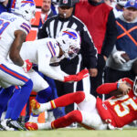 Jan 26, 2025; Kansas City, MO, USA; Kansas City Chiefs quarterback Patrick Mahomes (15) slides for a first down against the Buffalo Bills during the first half in the AFC Championship game at GEHA Field at Arrowhead Stadium. Mandatory Credit: Mark J. Rebilas-Imagn Images
