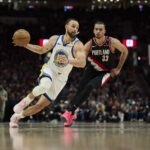Apr 11, 2025; Portland, Oregon, USA; Golden State Warriors guard Stephen Curry (30) drives to the basket during the second half against Portland Trail Blazers forward Toumani Camara (33) at Moda Center.