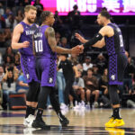 Apr 11, 2025; Sacramento, California, USA; Sacramento Kings forward DeMar DeRozan (10) talks with forward Domantas Sabonis (left) and guard Zach LaVine (8) during the fourth quarter against the Los Angeles Clippers at Golden 1 Center.