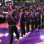 Apr 9, 2025; Toronto, Ontario, CAN; The Toronto Raptors players stand during the national anthems before a game against the Charlotte Hornets at Scotiabank Arena.