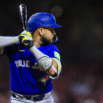 Sep 2, 2025; Cincinnati, Ohio, USA; Toronto Blue Jays shortstop Bo Bichette (11) at bat in the seventh inning against the Cincinnati Reds at Great American Ball Park. Mandatory Credit: Katie Stratman-Imagn Images
