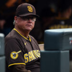 Sep 6, 2025; Denver, Colorado, USA; San Diego Padres manager Mike Shildt (8) looks on from the bench before the game against the Colorado Rockies at Coors Field. Mandatory Credit: Christopher Hanewinckel-Imagn Images
