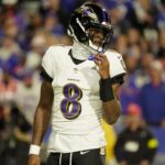 Baltimore Ravens quarterback Lamar Jackson looks down field before everyone lines up during first half action against the Baltimore Ravens at Highmark Stadium in Orchard Park on Sept. 7, 2025.