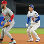 Sep 16, 2025; Los Angeles, California, USA; Los Angeles Dodgers two-way player Shohei Ohtani (17) leads off first base during the first inning against the Philadelphia Phillies at Dodger Stadium. Mandatory Credit: Jayne Kamin-Oncea-Imagn Images