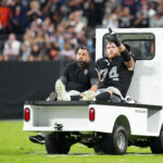 Sep 28, 2025; Paradise, Nevada, USA; Las Vegas Raiders offensive tackle Kolton Miller (74) is carted off during the second half against the Chicago Bears at Allegiant Stadium. Mandatory Credit: Stephen R. Sylvanie-Imagn Images