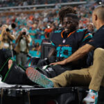 Sep 29, 2025; Miami Gardens, Florida, USA; Miami Dolphins wide receiver Tyreek Hill (10) reacts after being placed on a medical cart against the New York Jets during the second half at Hard Rock Stadium. Mandatory Credit: Sam Navarro-Imagn Images