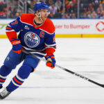 Sep 28, 2025; Edmonton, Alberta, CAN; Edmonton Oilers forward Connor McDavid (97) follows the play against the Vancouver Canucks at Rogers Place.