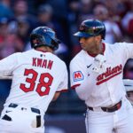Cleveland Guardians second base Brayan Rocchio (4), right, celebrates with left fielder Steven Kwan (38) after batting a solo home run against Detroit Tigers during the eighth inning of Game 2 of AL wild-card series at Progressive Field in Cleveland, Ohio on Wednesday, Oct. 1, 2025.
