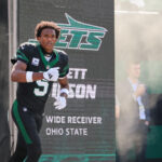 Oct 5, 2025; East Rutherford, New Jersey, USA; New York Jets wide receiver Garrett Wilson (5) takes the field prior to a game against the Dallas Cowboys at MetLife Stadium. Mandatory Credit: Vincent Carchietta-Imagn Images