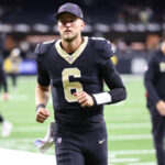 Oct 5, 2025; New Orleans, Louisiana, USA; New Orleans Saints quarterback Tyler Shough (6) walks off the field after their win against the New York Giants at Caesars Superdome. Mandatory Credit: Stephen Lew-Imagn Images