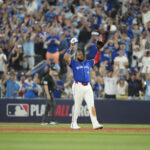 Onde assistir Oct 5, 2025; Toronto, Ontario, CAN; Toronto Blue Jays first baseman Vladimir Guerrero Jr. (27) celebrates after winning game two of the ALDS against the New York Yankees for the 2025 MLB playoffs at Rogers Centre. Mandatory Credit: Kevin Sousa-Imagn Images