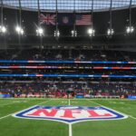 Oct 5, 2025; Tottenham, United Kingdom; The British, NFL shield logo and the United States flags during an NFL International Series game at Tottenham Hotspur Stadium.