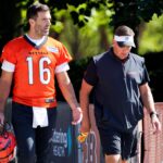Cincinnati Bengals quarterback Joe Flacco (16) walks out of Paycor Stadium to the practice fields, Wednesday, Oct. 8, 2025, in downtown Cincinnati.