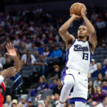Oct 8, 2025; Sacramento, California, USA; Sacramento Kings forward Keegan Murray (13) shoots the ball during the first quarter against the Toronto Raptors at Golden 1 Center. Mandatory Credit: Sergio Estrada-Imagn Images