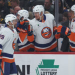 Oct 9, 2025; Pittsburgh, Pennsylvania, USA; New York Islanders left wing Jonathan Drouin (29) celebrates his goal with teammates against the Pittsburgh Penguins during the first period at PPG Paints Arena. Mandatory Credit: Charles LeClaire-Imagn Images