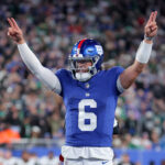Oct 9, 2025; East Rutherford, New Jersey, USA; New York Giants quarterback Jaxson Dart (6) celebrates after a touchdown against the Philadelphia Eagles during the fourth quarter of the game at MetLife Stadium. Mandatory Credit: Brad Penner-Imagn Images