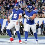 Oct 9, 2025; East Rutherford, New Jersey, USA; New York Giants quarterback Jaxson Dart (6) and running back Cam Skattebo (44) celebrate Skattebo's touchdown against the Philadelphia Eagles during the second quarter at MetLife Stadium.