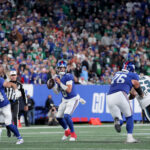 Oct 9, 2025; East Rutherford, New Jersey, USA; New York Giants quarterback Jaxson Dart (6) looks to pass against the Philadelphia Eagles during the fourth quarter at MetLife Stadium. Mandatory Credit: Brad Penner-Imagn Images