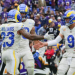 Oct 12, 2025; Baltimore, Maryland, USA; Los Angeles Rams running back Kyren Williams (23), tight end Tyler Higbee (89) and quarterback Matthew Stafford (9) celebrate after scoring a touchdown against the Baltimore Ravens during the third quarter of the game at M&T Bank Stadium. Mandatory Credit: Mitch Stringer-Imagn Images