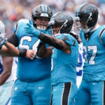 Oct 12, 2025; Charlotte, North Carolina, USA; Carolina Panthers running back Rico Dowdle (5) celebrates a first down during the second half against the Dallas Cowboys at Bank of America Stadium. Mandatory Credit: Scott Kinser-Imagn Images