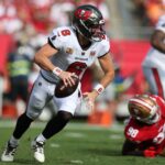 Oct 12, 2025; Tampa, Florida, USA; Tampa Bay Buccaneers quarterback Baker Mayfield (6) runs in the pocket during the first quarter against the San Francisco 49ers at Raymond James Stadium.