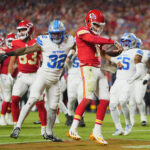 Oct 12, 2025; Kansas City, Missouri, USA; Kansas City Chiefs quarterback Patrick Mahomes (15) rushes for a touchdown against the Detroit Lions during the first half at GEHA Field at Arrowhead Stadium.