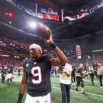 11Oct 13, 2025; Atlanta, Georgia, USA; Atlanta Falcons quarterback Michael Penix Jr. (9) leaves the field following a game against the Buffalo Bills at Mercedes-Benz Stadium. Mandatory Credit: Brett Davis-Imagn Images
