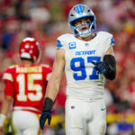 Oct 12, 2025; Kansas City, Missouri, USA; Detroit Lions defensive end Aidan Hutchinson (97) reacts during the second half against the Kansas City Chiefs at GEHA Field at Arrowhead Stadium. Mandatory Credit: Jay Biggerstaff-Imagn Images
