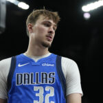 Oct 15, 2025; Las Vegas, Nevada, USA; Dallas Mavericks forward Cooper Flagg (32) looks outward during the second half against the Los Angeles Lakers at T-Mobile Arena. Mandatory Credit: Lucas Peltier-Imagn Images