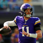 Oct 19, 2025; Minneapolis, Minnesota, USA; Minnesota Vikings quarterback Carson Wentz (11) makes a pass during the first half against the Philadelphia Eagles at U.S. Bank Stadium. Mandatory Credit: Jeffrey Becker-Imagn Images