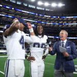 Oct 19, 2025; Arlington, Texas, USA; Dallas Cowboys quarterback Dak Prescott (4) and wide receiver Ceedee Lamb (88) speak to Fox Sports broadcaster Tom Rinaldi after the game against the Washington Commanders at AT&T Stadium. Mandatory Credit: Kevin Jairaj-Imagn Images