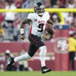 Oct 19, 2025; Santa Clara, California, USA; Atlanta Falcons quarterback Michael Penix Jr. (9) runs with the ball during the second quarter against the San Francisco 49ers at Levi's Stadium. Mandatory Credit: Kyle Terada-Imagn Images