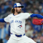 Oct 20, 2025; Toronto, Ontario, CAN; Toronto Blue Jays pitcher Kevin Gausman (34) throws in the seventh inning against the Seattle Mariners during game seven of the ALCS round for the 2025 MLB playoffs at Rogers Centre. Mandatory Credit: Nick Turchiaro-Imagn Images