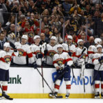 Oct 21, 2025; Boston, Massachusetts, USA; Florida Panthers left wing Brad Marchand (63), left, reacts to the applause from Boston fans after a tribute to him played during a timeout in the first period against the Boston Bruins at TD Garden. Mandatory Credit: Winslow Townson-Imagn Images