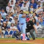 Onde assistir Oct 28, 2025; Los Angeles, California, USA; Toronto Blue Jays first baseman Vladimir Guerrero Jr. (27) hits a two run home run during the third inning against the Los Angeles Dodgers during game four of the 2025 MLB World Series at Dodger Stadium. Mandatory Credit: Jayne Kamin-Oncea-Imagn Images
